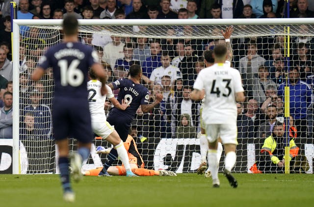 Manchester City’s Gabriel Jesus, centre, scores against Leeds