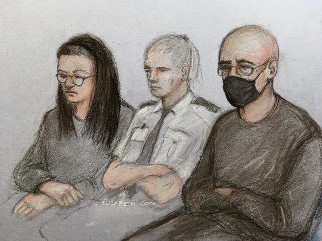 Court artist sketch by Elizabeth Cook of Angharad Williamson, 30, and her partner, John Cole, 39, in the dock at Cardiff Crown Court (Elizabeth Cook/PA)