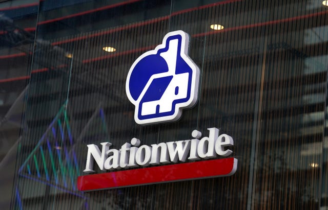 A Nationwide Building Society sign on a glass background 