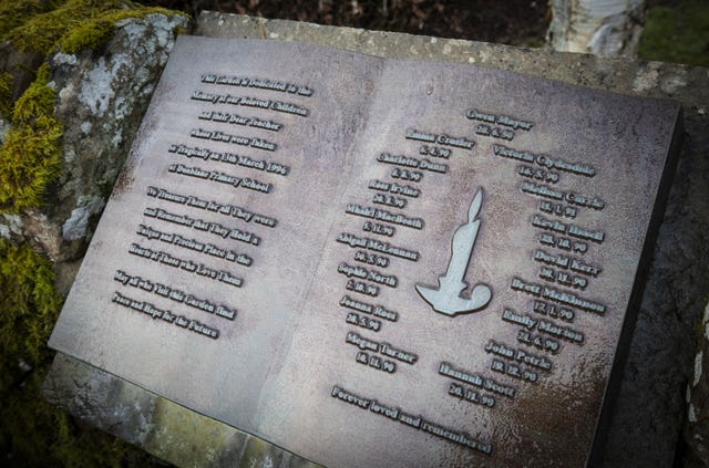 A memorial plaque for the victims of the Dunblane massacre at the entrance to the Garden of Remembrance at Dunblane Cemetery 