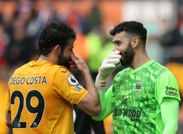 Wolves striker Diego Costa shares a joke with Brentford goalkeeper David Raya. Former Chelsea striker Costa returned to England in September on a deal until the end of the season. He claimed his first Premier League goal in six years by opening the scoring in his side's 2-0 win over the Bees in April - ending an 18-game drought for Wanderers in all competitions. The Brazil-born player had been sent off for a headbutt at Brentford earlier in the season. Wolves flirted with relegation and were bottom of the division when play was paused for the World Cup. They eventually finished well clear of the drop zone under ex-Real Madrid boss Julen Lopetegui, who succeeded Bruno Lage in November