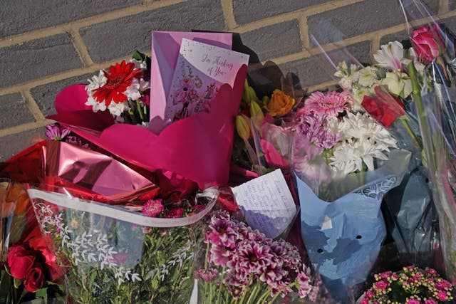 Floral tributes left outside Leabank flats