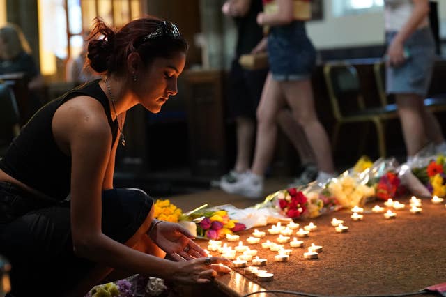 People at a vigil at St Peter’s church in Nottingham