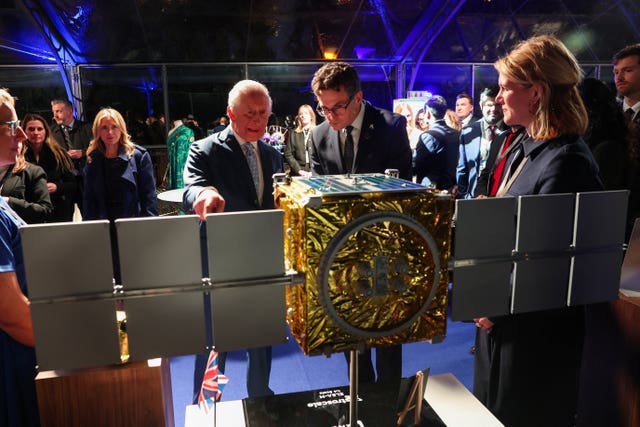 Charles views a scale replica of Astroscale ELSA-M satellite