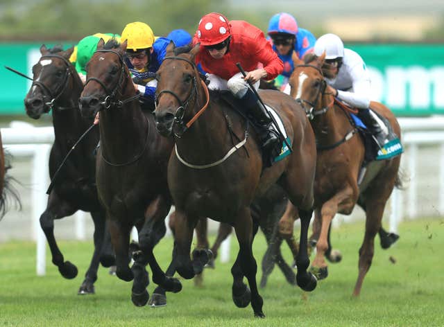 Garswood (red) won the Lennox Stakes at Goodwood for Richard Fahey