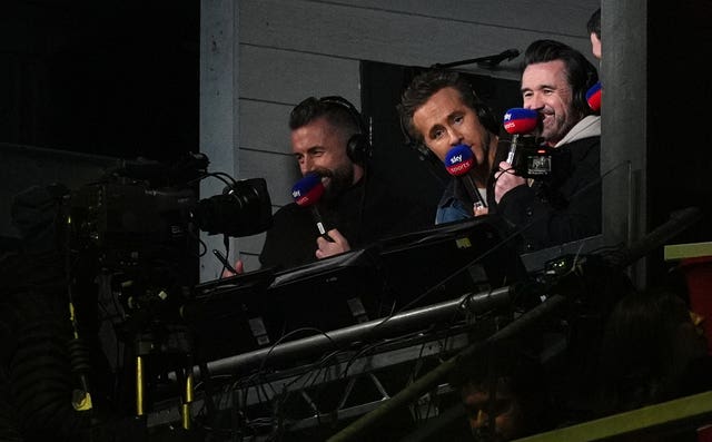 Reynolds, centre, and Mac in the gantry