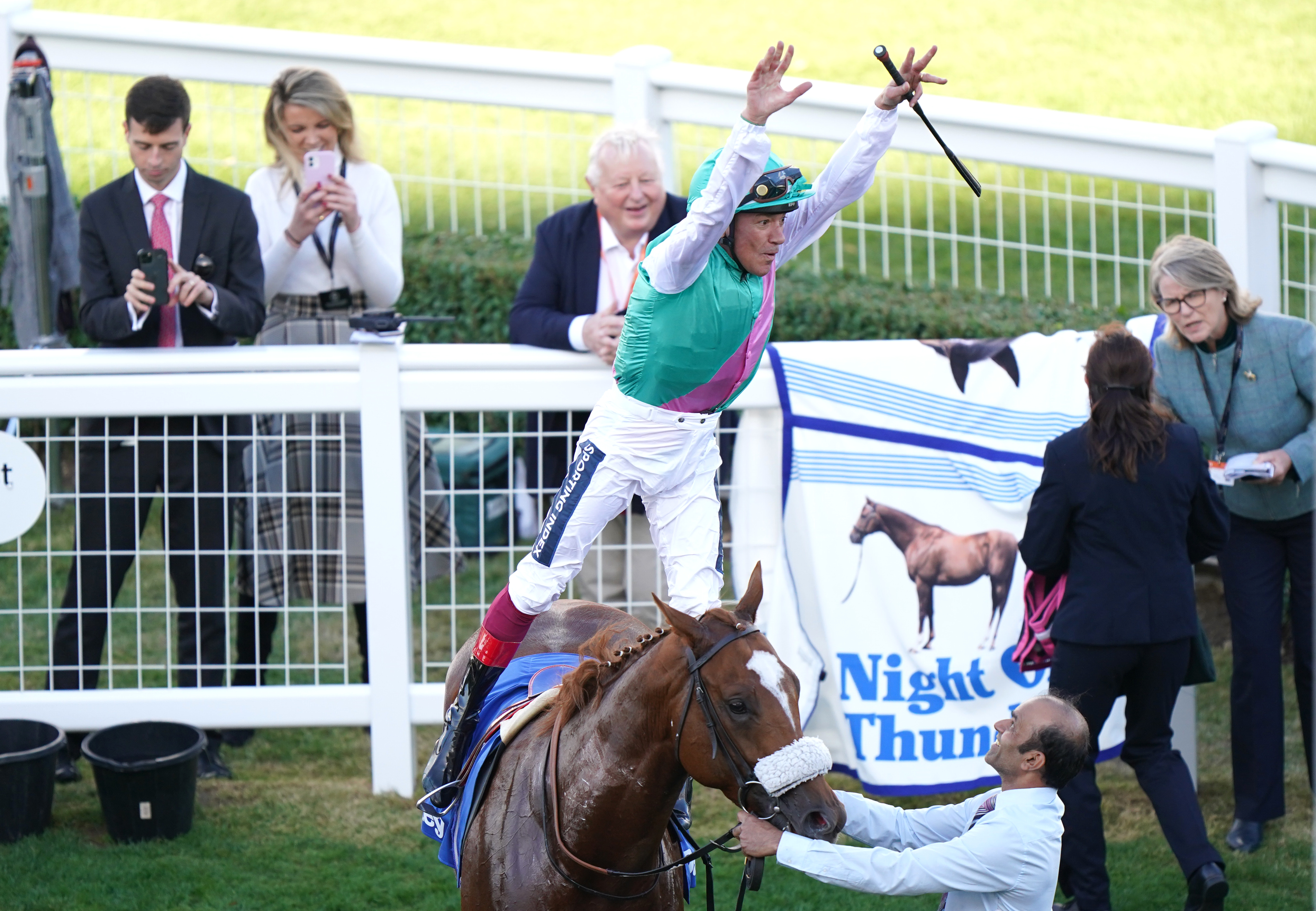 Frankie Dettori performs a flying dismount after winning the Darley Dewhurst Stakes on Chaldean at Newmarket