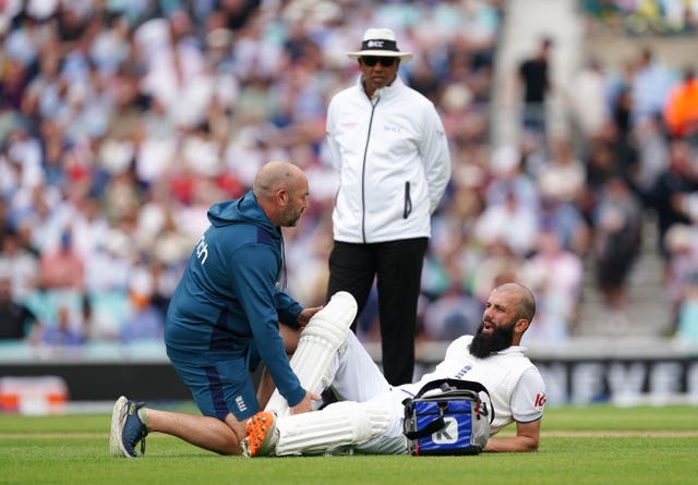 Moeen Ali seeks treatment for an injury during day one