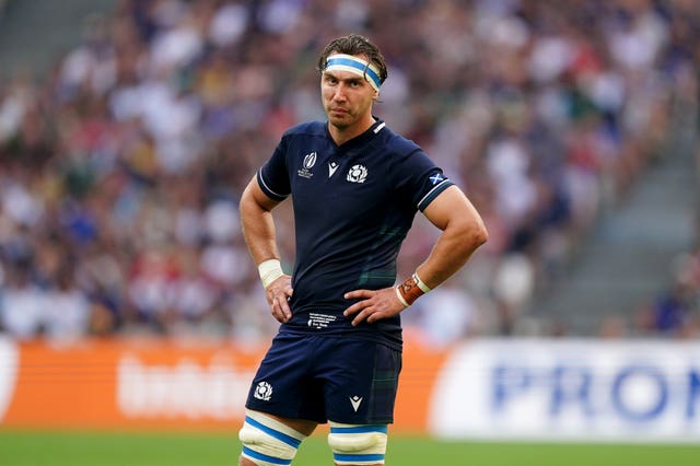 Scotland's Jamie Ritchie stands with hands on hips during a World Cup match against South Africa