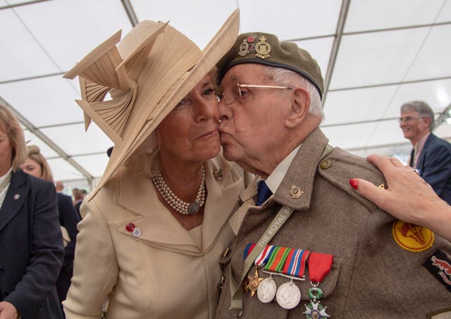 Veteran kisses Camilla