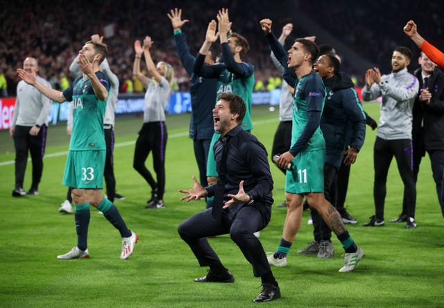 Mauricio Pochettino, centre, and Tottenham celebrate their Champions League semi-final win over Ajax in 2019