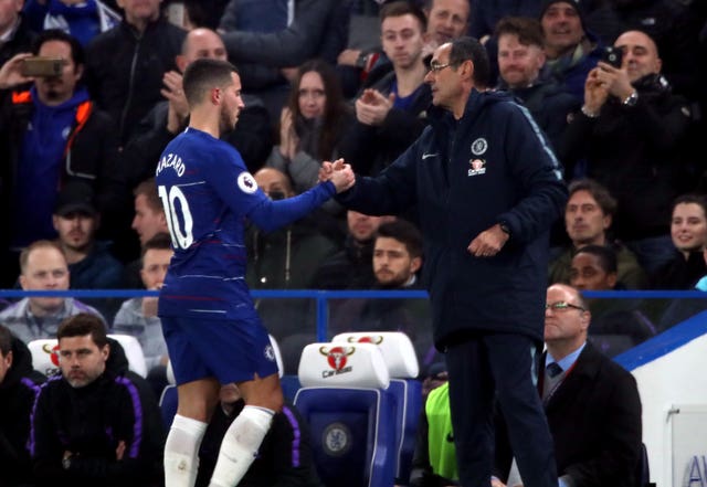 Eden Hazard shakes hands with Maurizio Sarri (PA)