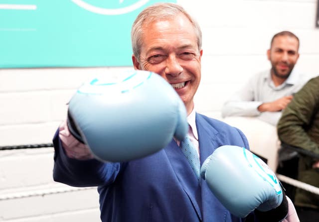 Reform UK leader Nigel Farage wearing boxing gloves at a boxing gym in Clacton, Essex, while on the General Election campaign trail