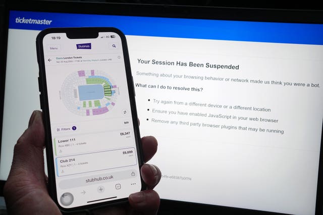 Ticketmaster site on phone and laptop