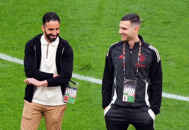 Ruben Amorim, left, and Diogo Dalot on the pitch at San Mames