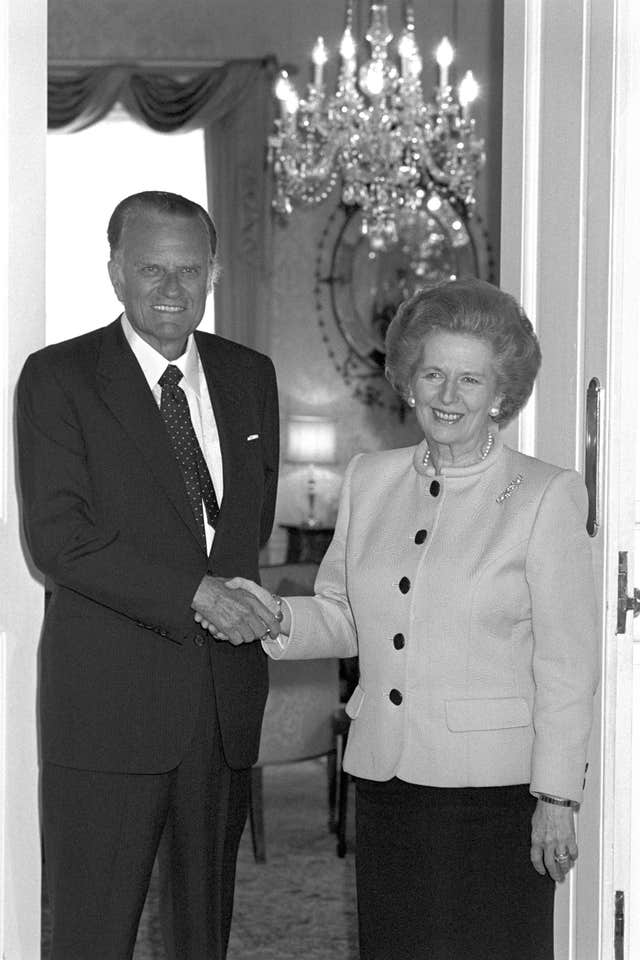 Billy Graham, seen here with Margaret Thatcher, was a confidant of several US presidents (PA)