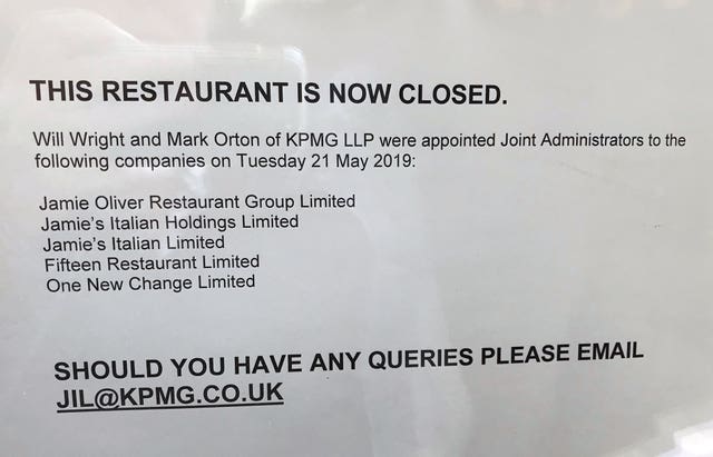 A sign in the window of a Jamie’s Italian restaurant