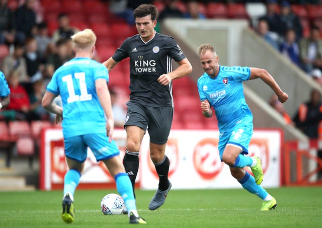 Harry Maguire, centre, joined Leicester in 2017