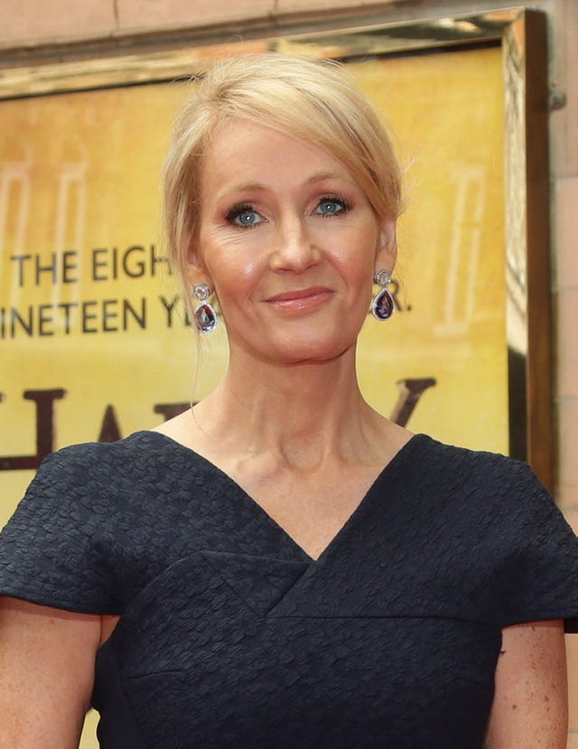 JK Rowling smiles at the camera