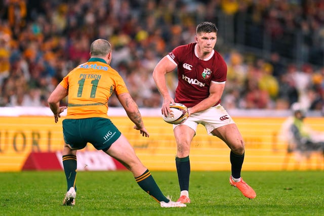 Owen Farrell prepares to throw the ball while playing for the Lions against Australia