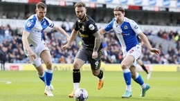 Adam Armstrong, centre, keeps hold of the ball (Richard Sellers/PA)