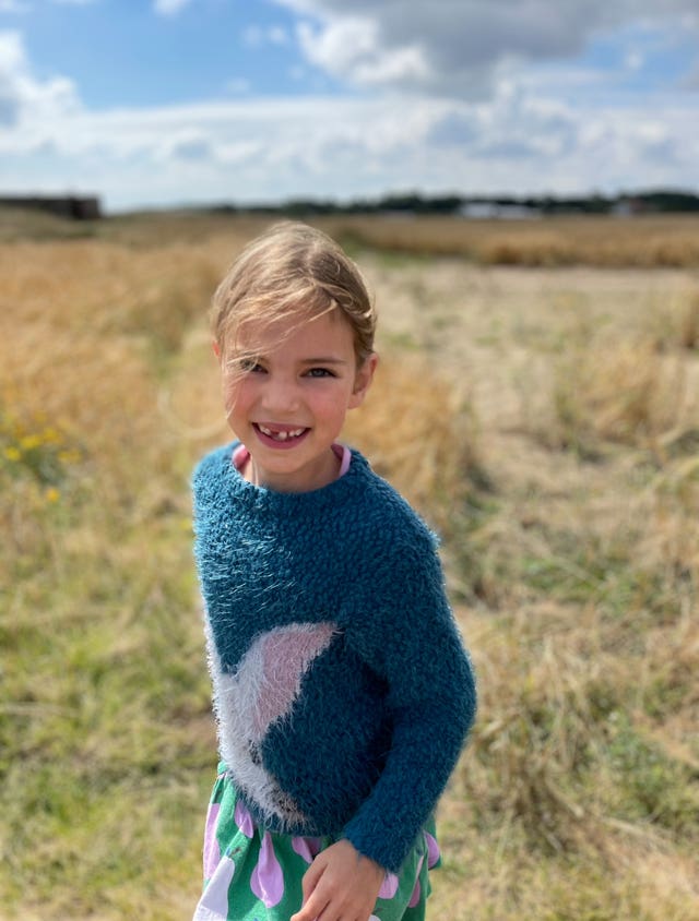 Emily Smith smiles at the camera