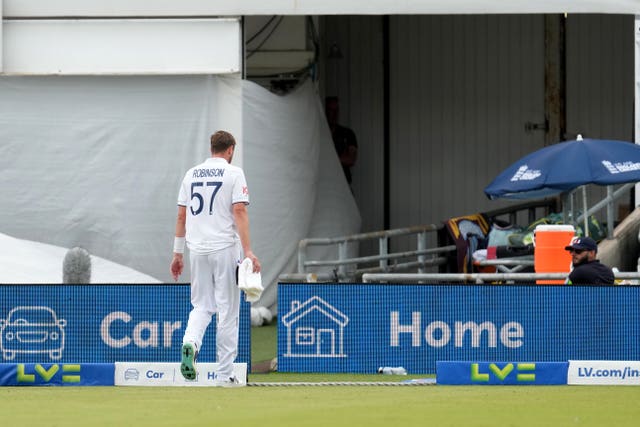 Ollie Robinson leaves the field after suffering a back spasm at Headingley