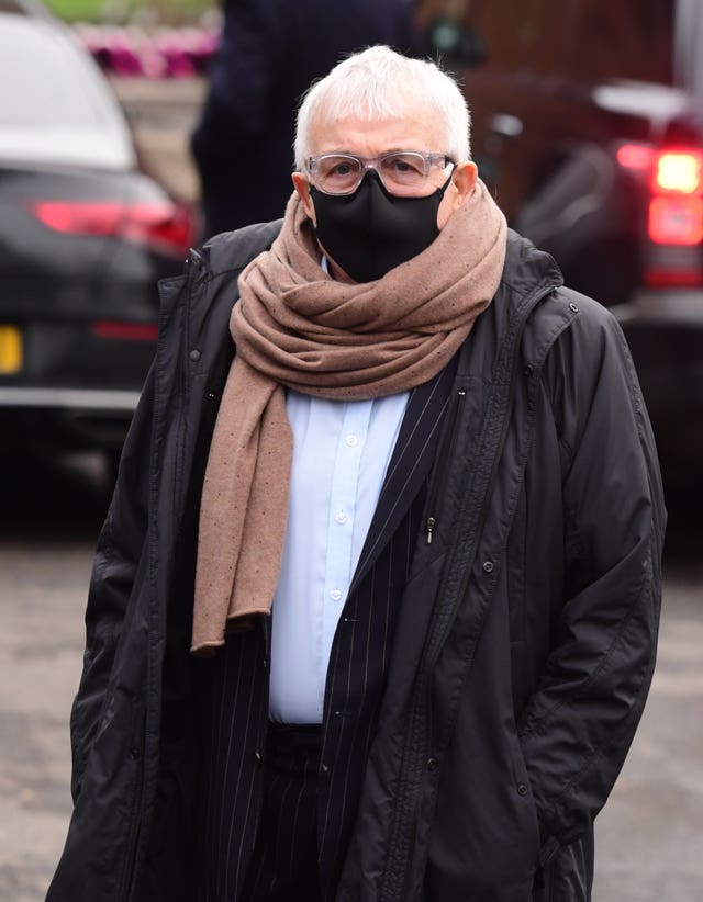 Christopher Biggins arrives at Golders Green Crematorium, north London, for the private funeral service of Dame Barbara Windsor