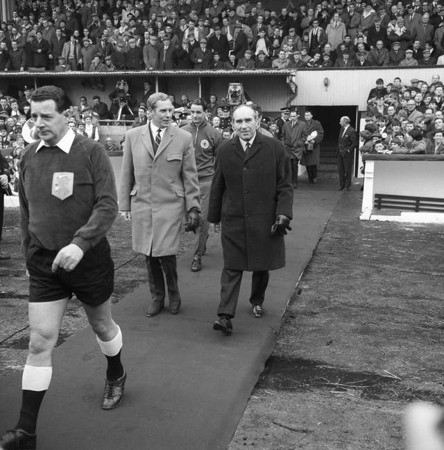 Bobby Brown, left, walks out with England manager Alf Ramsey