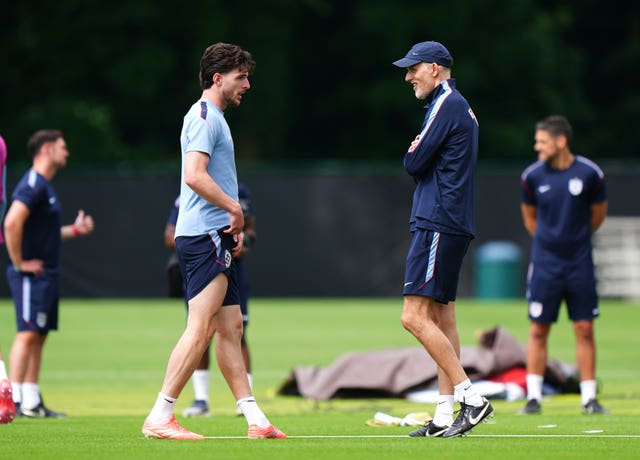 England’s Declan Rice, left, and manager Thomas Tuchel during a training session