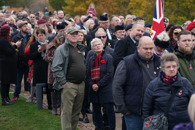 Crowds gather ahead of the service