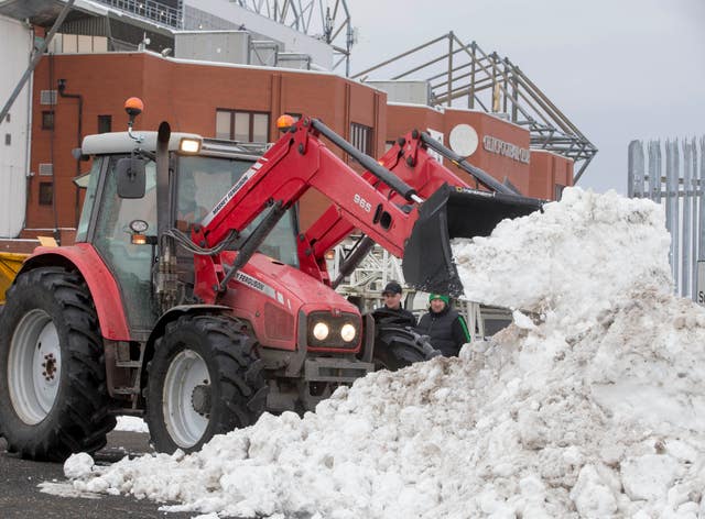 Snow is cleared outside the ground ahead of the William Hill Scottish Cup, Quarter Final match at Celtic Park, Glasgow (Jeff Holmes/PA)
