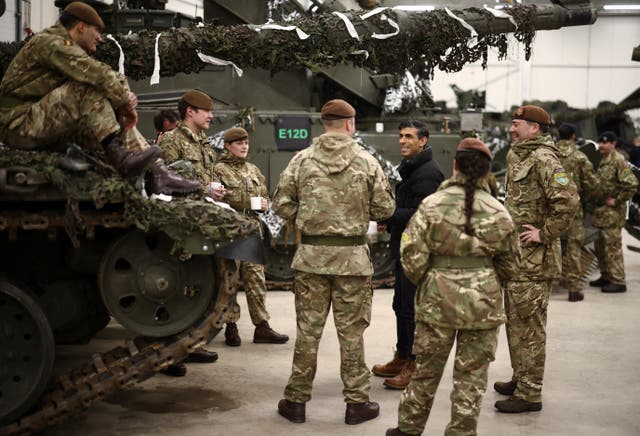 The Prime Minister talks with King’s Royal Hussars 