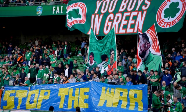 Republic of Ireland fans hold up a banner in support of Ukraine
