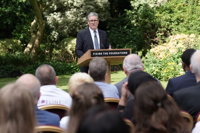 Sir Keir Starmer speaking to journalists in a garden