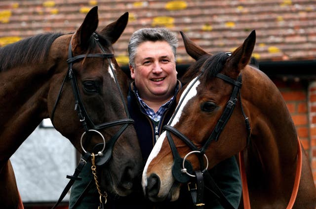 Paul Nicholls with Denman (left) and Kauto Star (right)