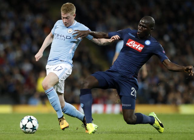 Napoli’s Kalidou Koulibaly (right) is expected to follow Sterling to Stamford Bridge.
