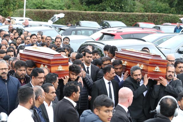 The coffins of Reuven Simon and Joseph Sebastian outside St Mary’s Church in Ardmore