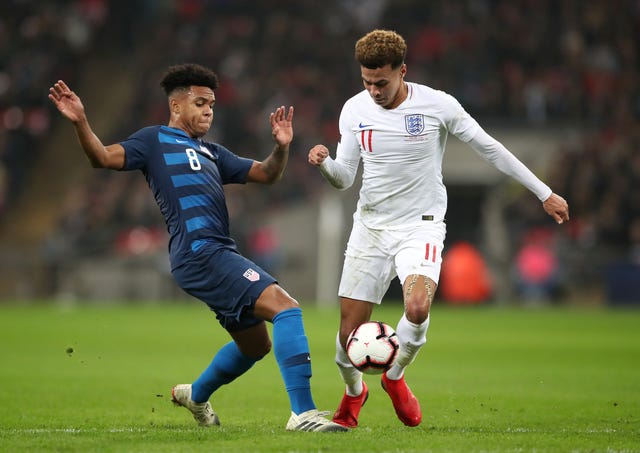 Weston McKennie, left, made his national team debut for the USA as a teenager