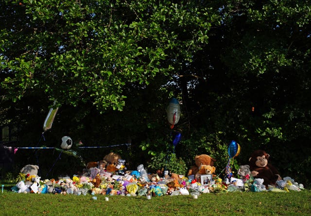 Tributes left at the scene in the Sarn area of Bridgend, south Wales, near to where five-year-old Logan Mwangi was found dead (Ben Birchall/PA)