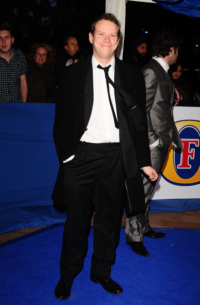 Robert Webb smiles at the camera as he attends the British Comedy Awards in London