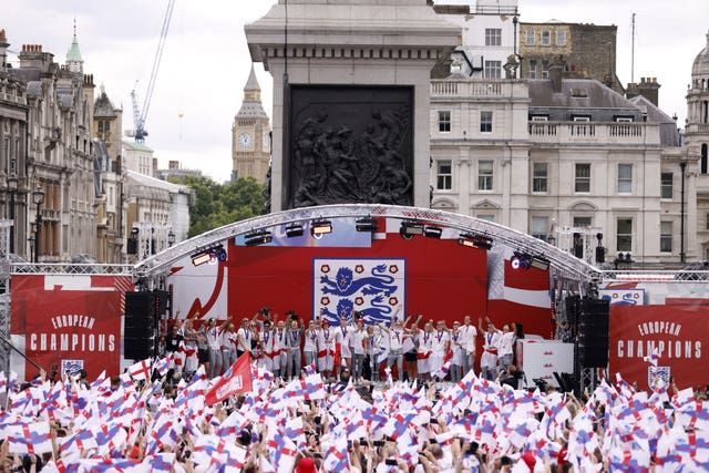 England players sing with supporters in Trafalgar Square