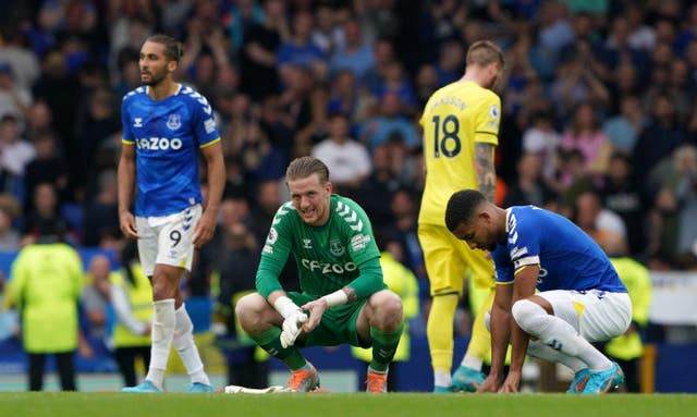 Everton players show their dejection after defeat by Brentford