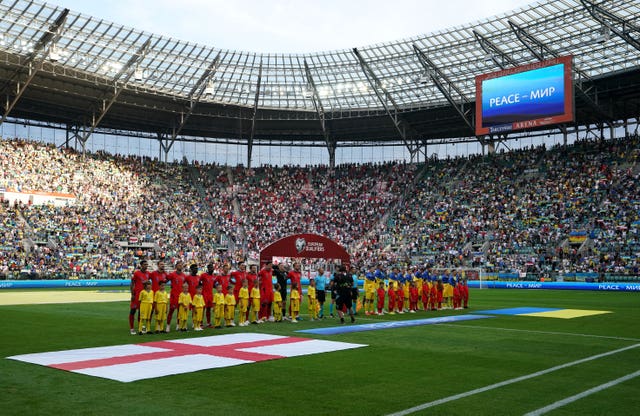 Ukraine and England players prior to the Euro 2024 qualifier in Wroclaw (Nick Potts/PA)