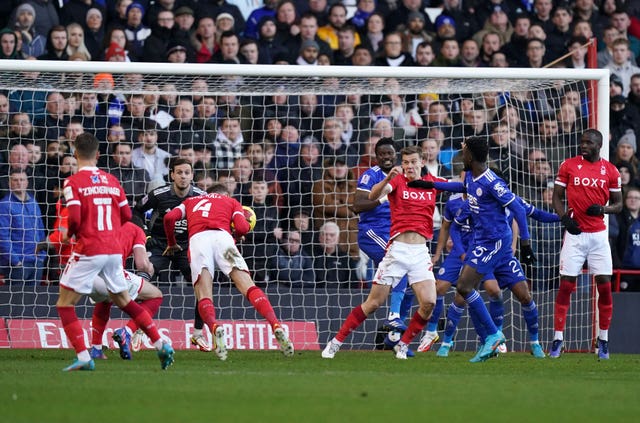 Joe Worrall, third left, scores Nottingham Forest’s third goal against Leicester