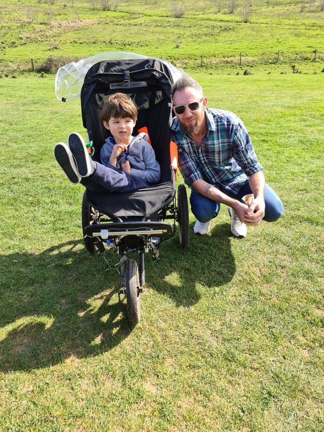 Matt Hughes, with son Charlie 