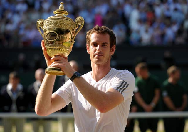 Sir Andy celebrates winning his first Wimbledon title in 2013. Adam Davy/PA Wire