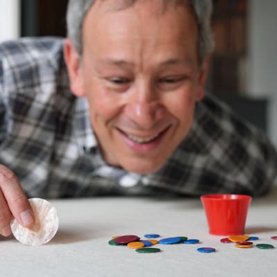 Can he flick it? Yes he can – professor sees off tiddlywinks title challenger