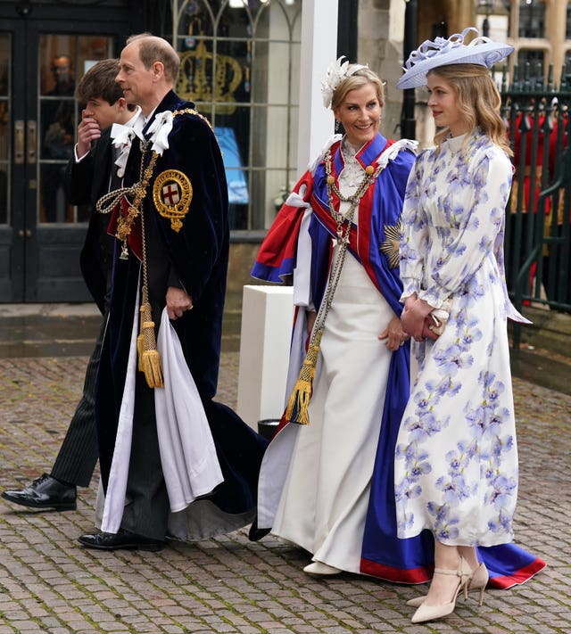 Lady Louise with her parents and brother 