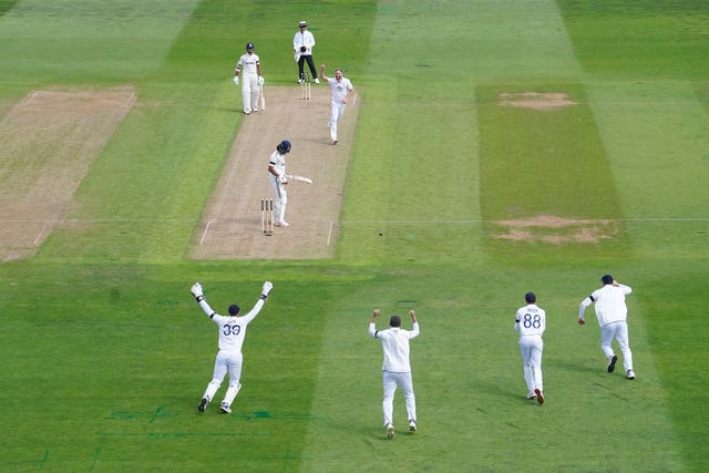England bowler Chris Woakes celebrates taking the wicket of India’s KL Rahul 